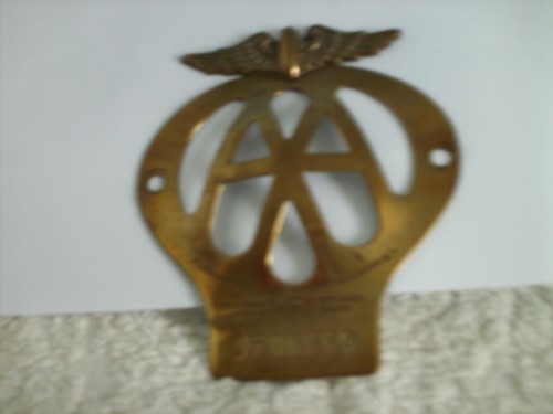 Old brass badge - aa,